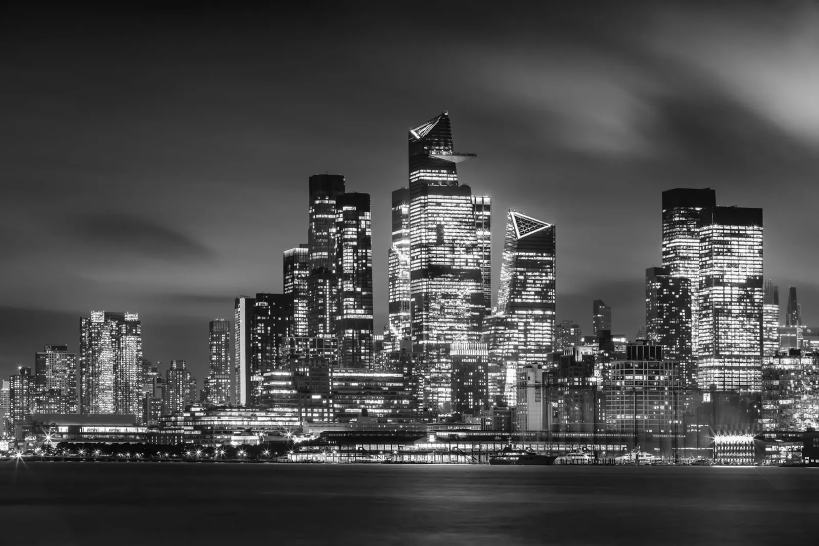 Striking NYC skyline with Hudson Yards in the evening | Monochrom canvas with Floater frame by Melanie Viola