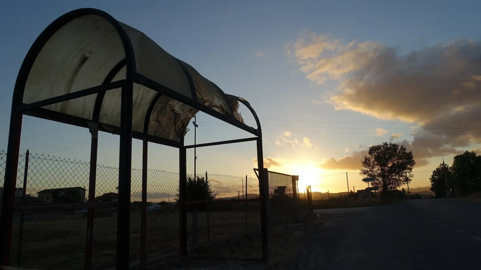 Sunset on the bus stop canvas with Floater frame by Massimo Frascogna