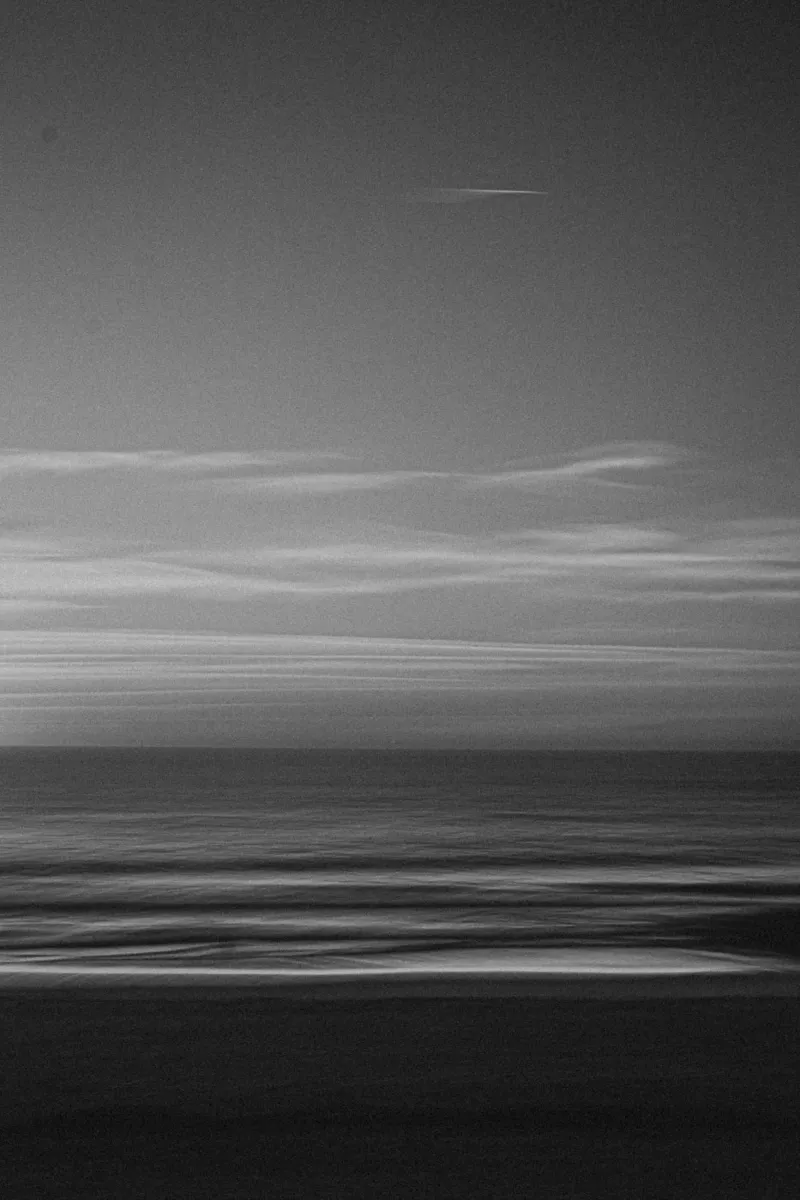 Drift Into Dusk - Black and white retro coastal photography canvas with Floater frame by Barefoot Visuals