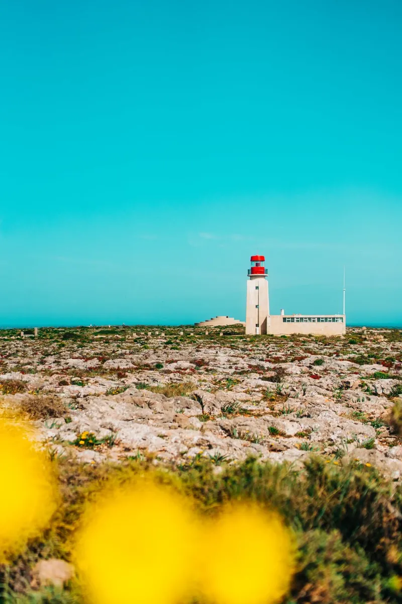 Lighthouse on the Portuguese Atlantic coast canvas with Floater frame by Bold and Retro