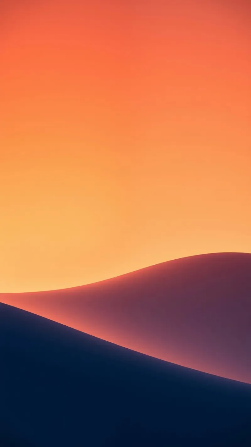 smooth hills under a gradient sunset sky with warm orange hahnemühle by DesignDoodle