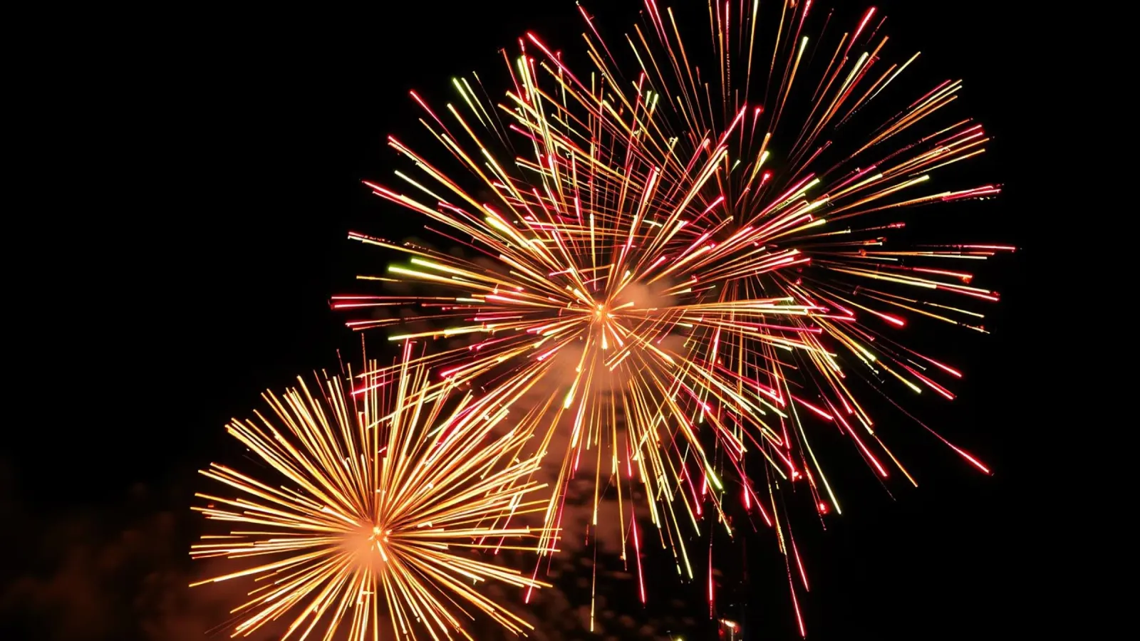 fireworks illuminate the night sky in a spectacular display canvas by DesignDoodle