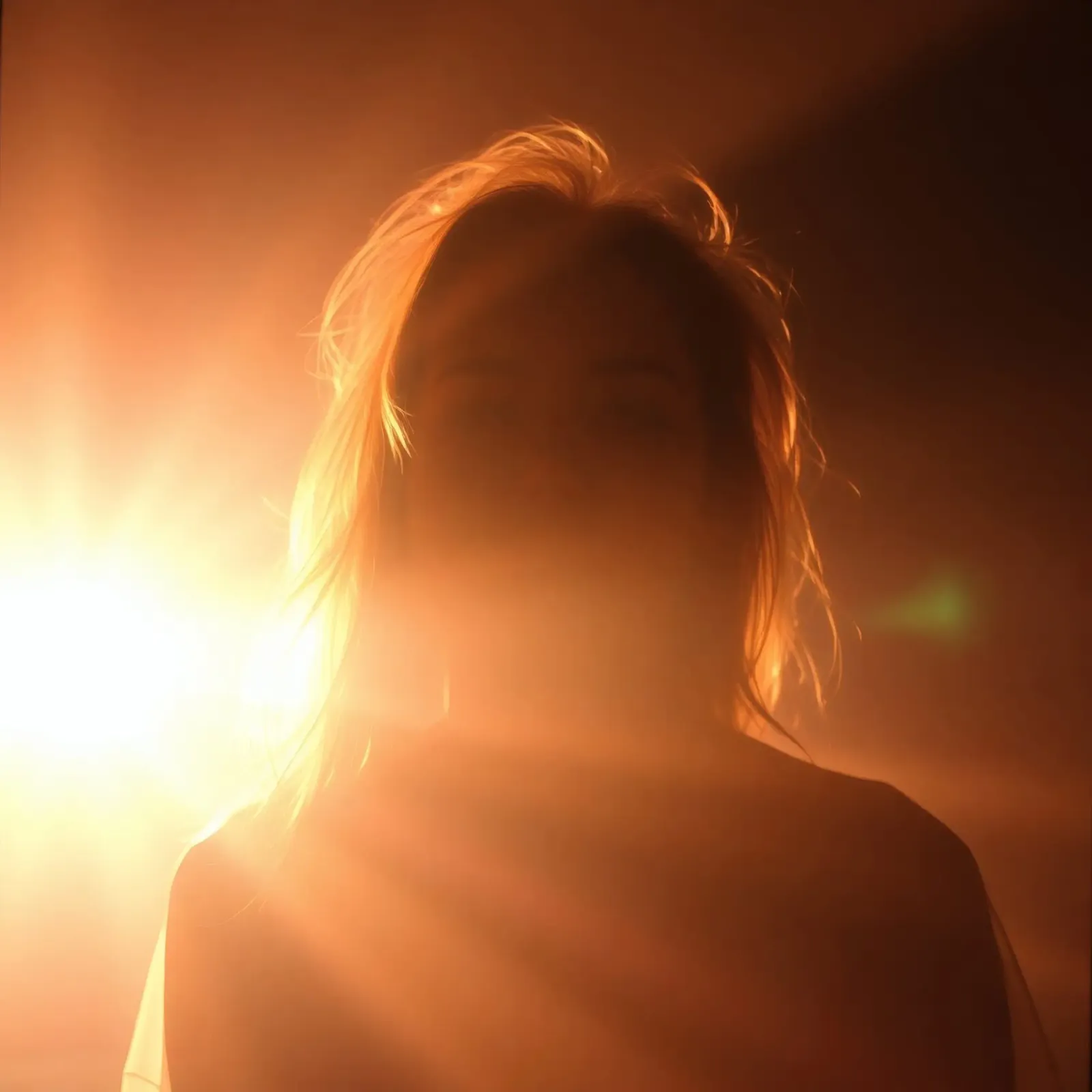 Soft light creates silhouette of a person in a warm glow canvas by DesignDoodle