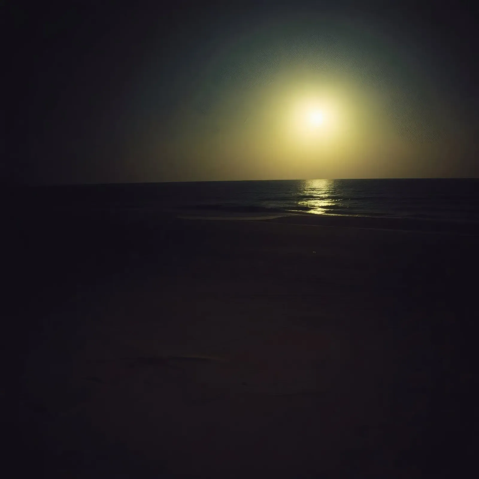 Moonlit beach night with shimmering water under a clear sky canvas with Floater frame by DesignDoodle