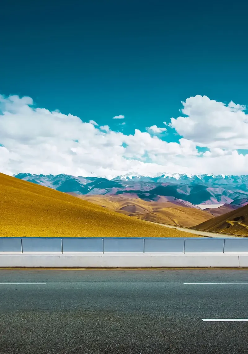 mountains road highway sky clouds landscape traffic backlit film by Kirsten C Nolan