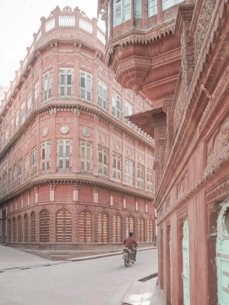Pastel pink streets of Rajasthan poster with wooden frame by Kimberley Jekel Photography