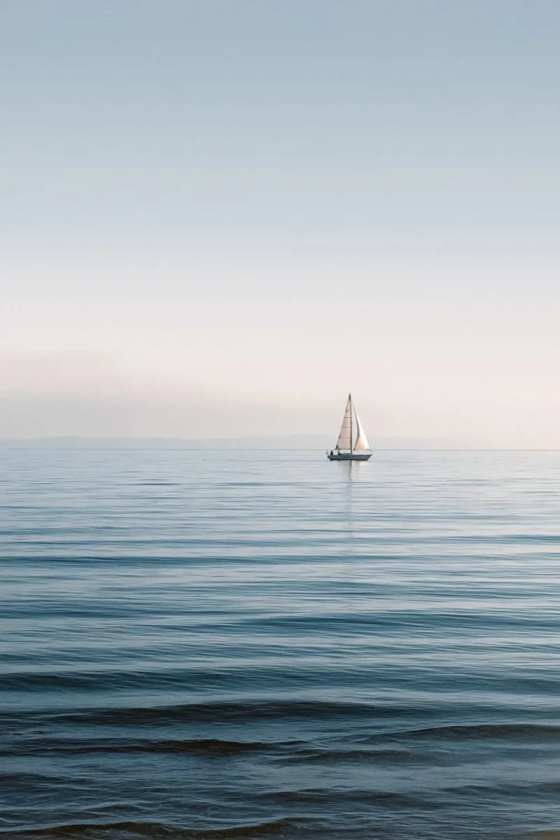 Minimalist Sailboat on Calm Ocean plexiglass da Indigo Tides Art