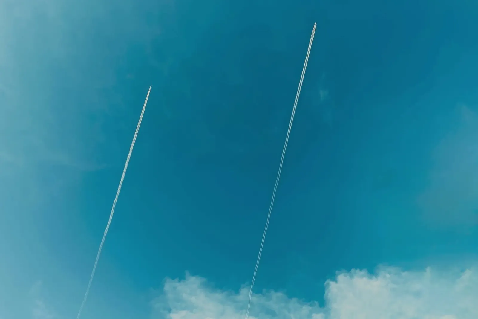 Twin contrails in the Blue Sky canvas by KISSA STUDIO
