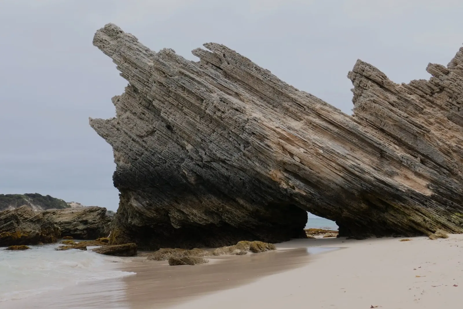 Jagged Rock at the beach in Australia Sticker canvas with Floater frame by byrieneke