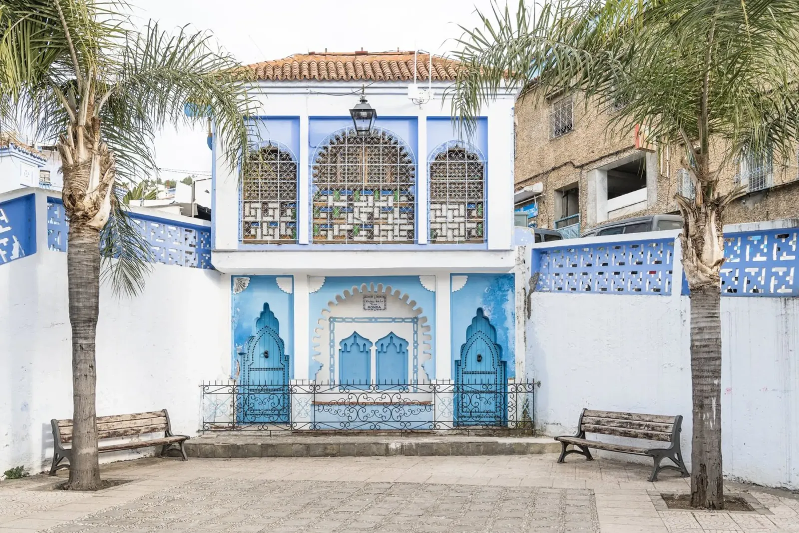 Square in blue city Chefchaouen poster with aluminum frame by photolovers