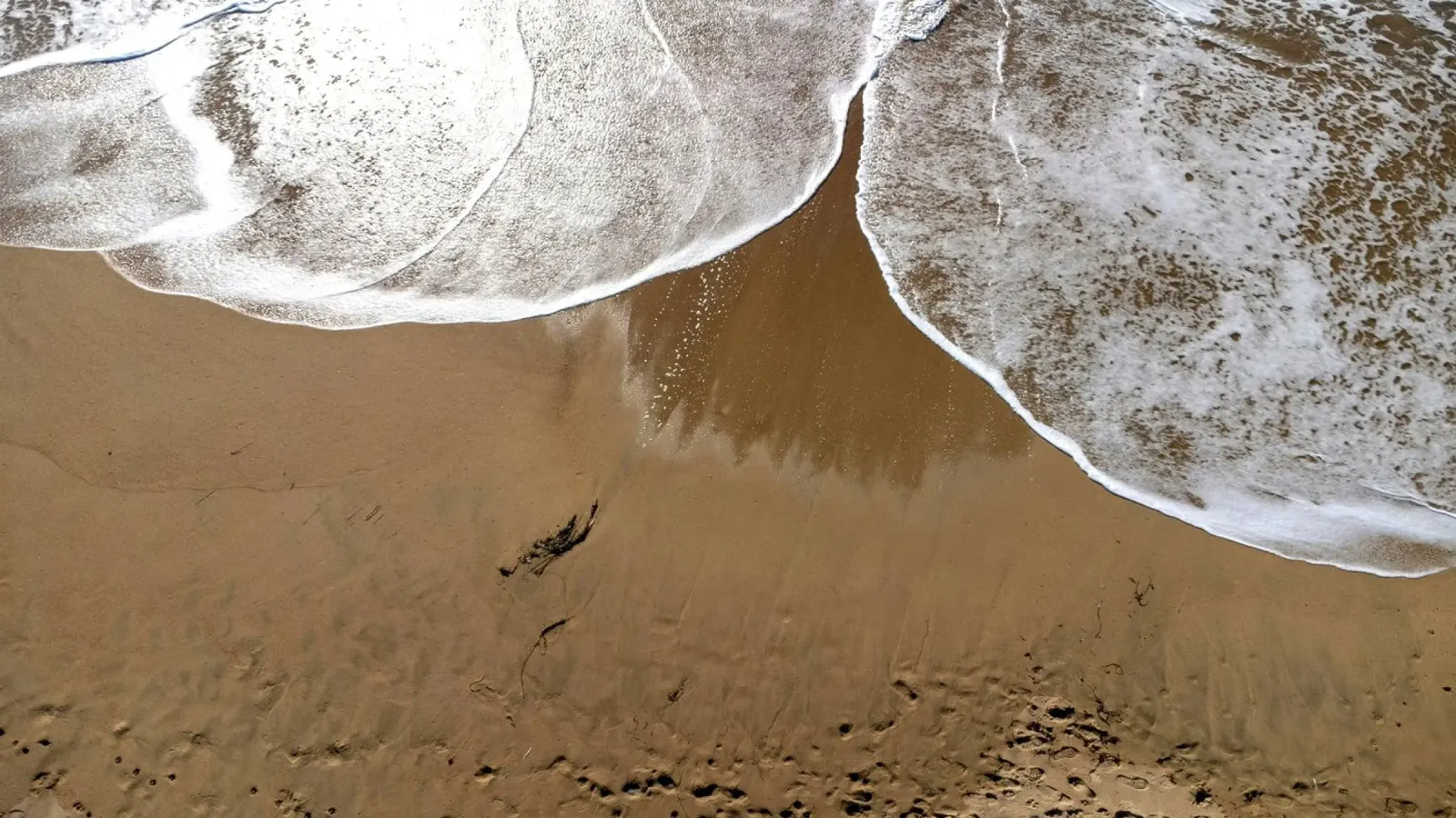 onda nei modelli di marea pellicola backlit da life of sands