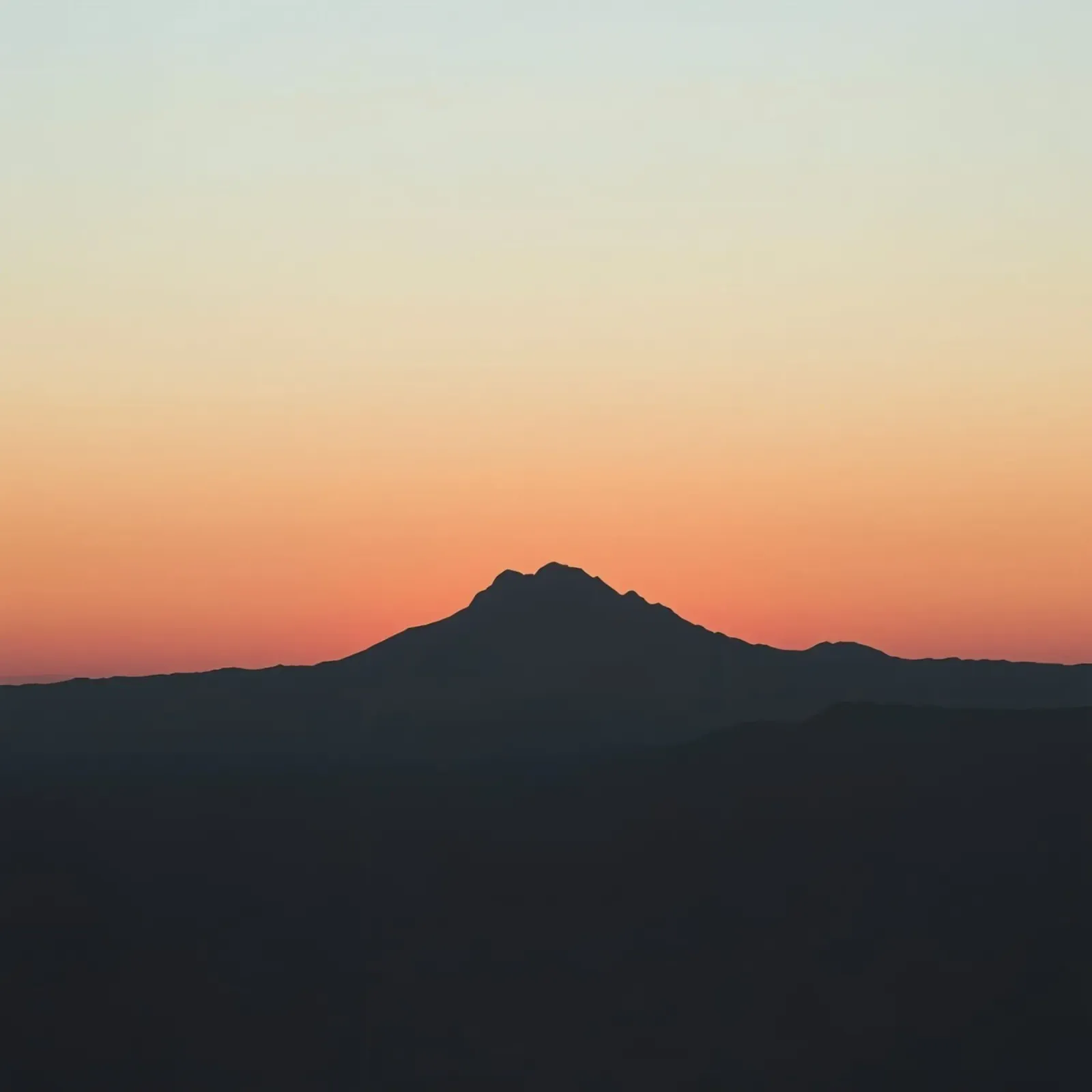 Mountain range silhouette against twilight sky showing tones canvas with Floater frame by DesignDoodle
