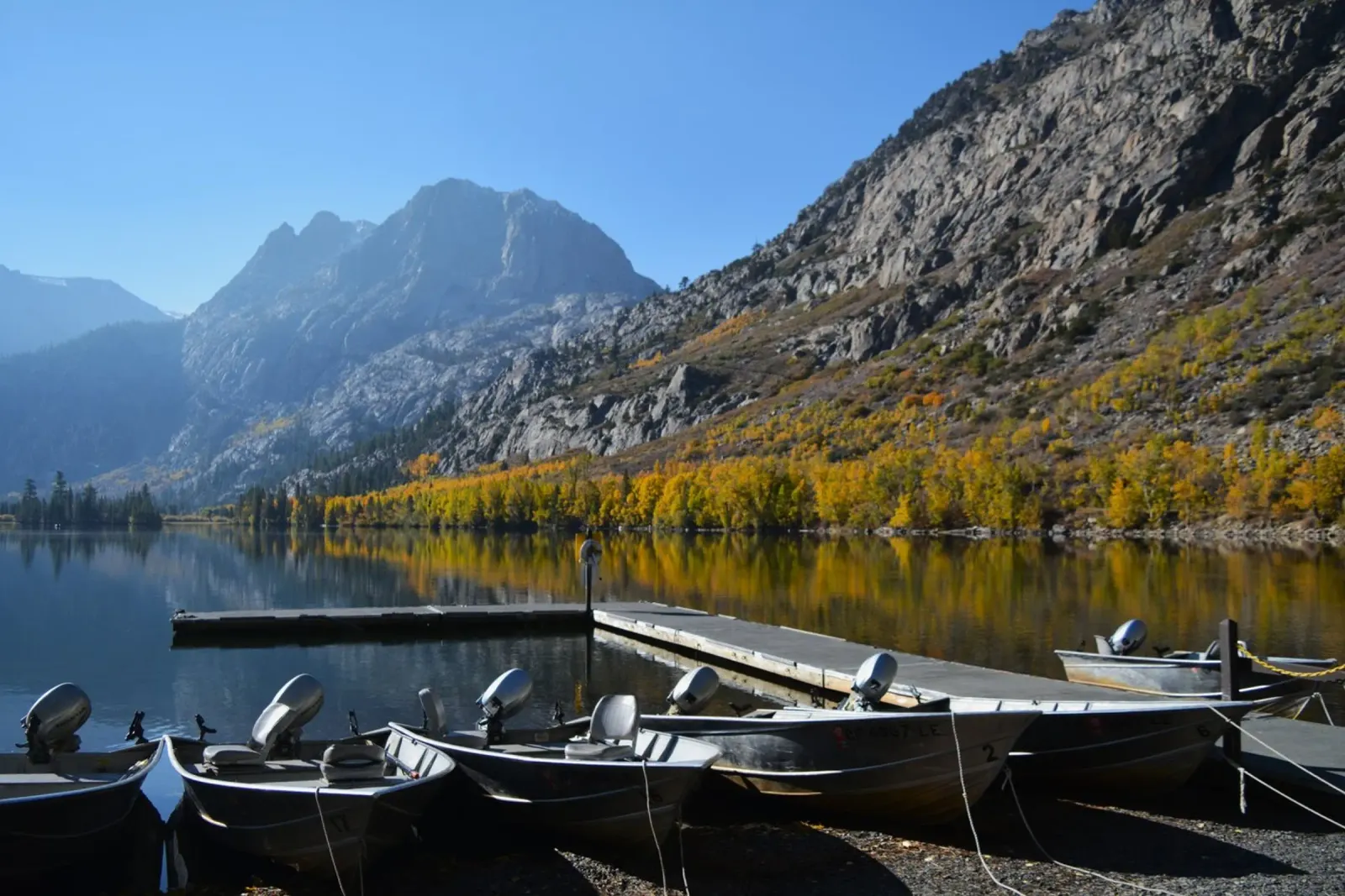 Serene Lake Morning with Dock and Boats hahnemühle by byrieneke