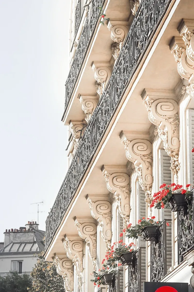 Red flowers on Paris balcony poster con telaio in plastica da GraceDigitalArtCo