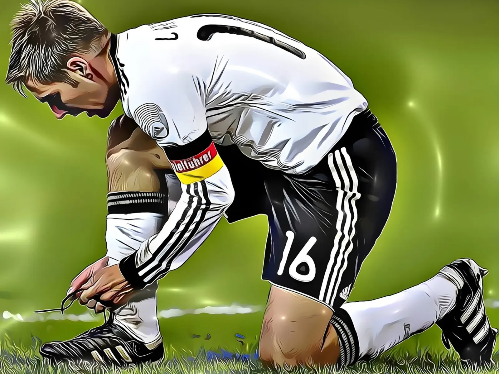 Il capitano della nazionale tedesca Philipp Lahm si allaccia i lacci delle scarpe tela con Cornice a cassetta da dark eagle