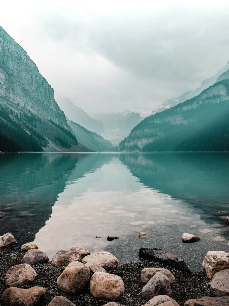 Turquoise mountain lake - a natural wonder in the Alps canvas with Floater frame by Whole©