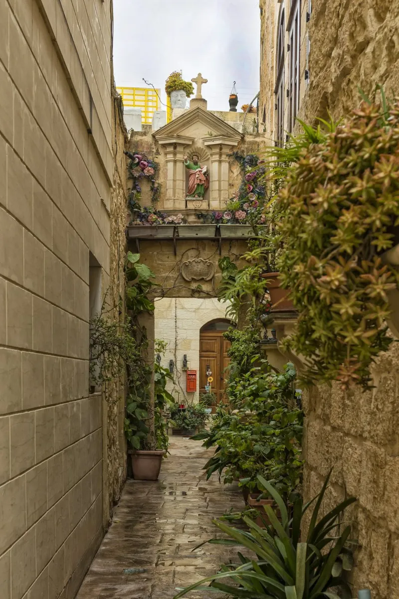 Quaint Alleyway with Relics Malta canvas with Floater frame by Curious Collections by Marielle Leenders