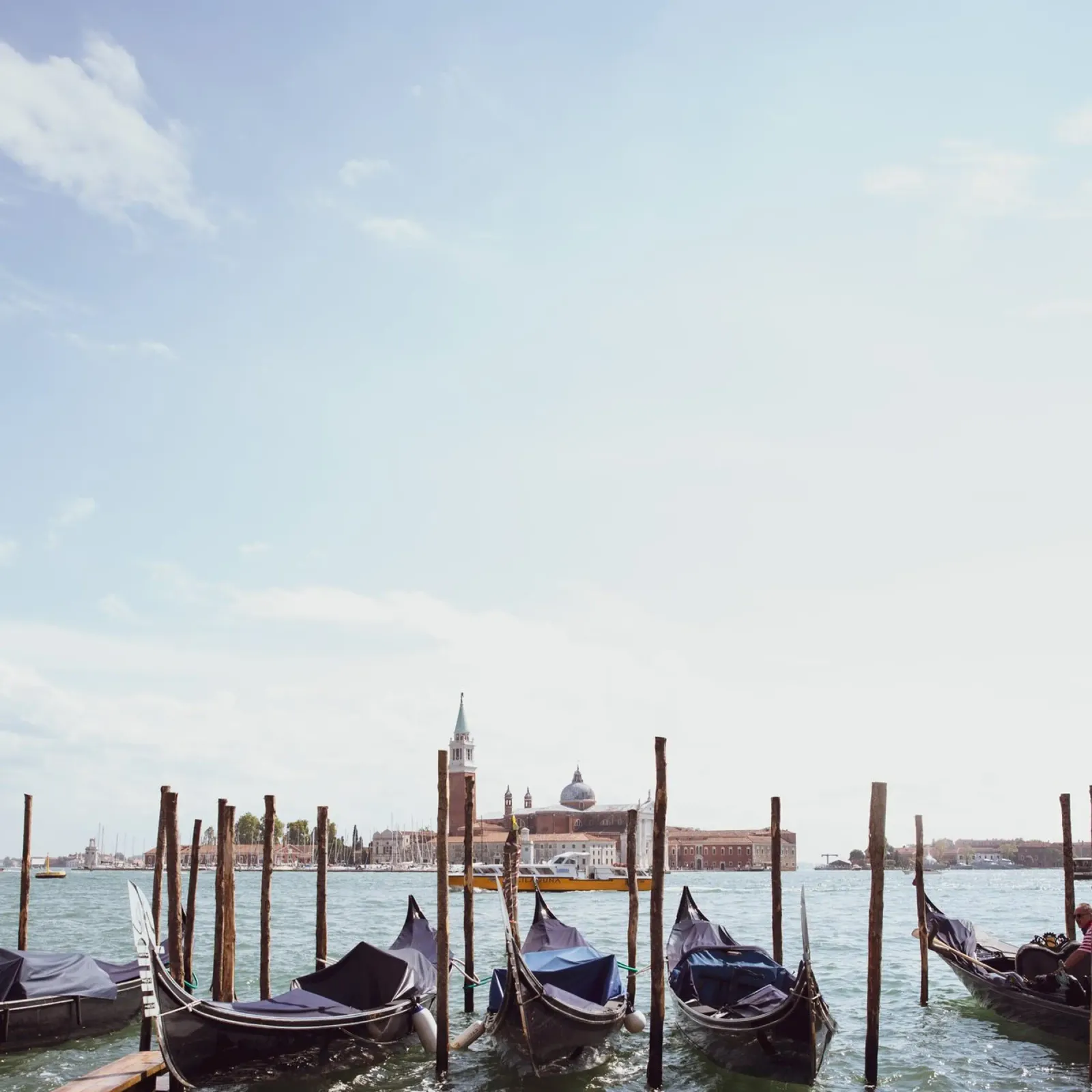 Gondolas in front of a blue sky in Venice, Italy canvas with Floater frame by Lisa Jureczko Arts Illustration